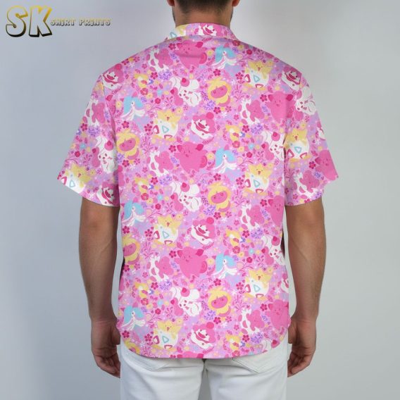 Mens pink tropical shirt displaying cute colorful creatures and tropical elements