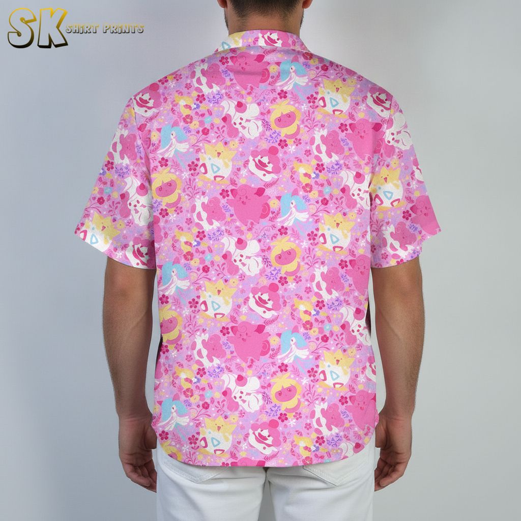 Mens pink tropical shirt displaying cute colorful creatures and tropical elements