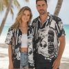 Operator Hawaiian shirt in a black and white collage pattern with vintage Champagne and Glen label text and a retro alien face print