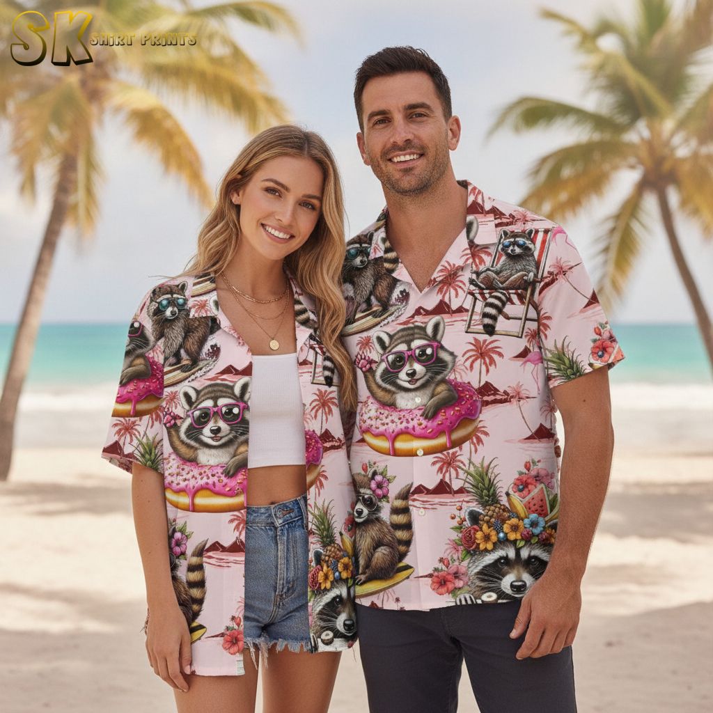 Pink and black Hawaiian shirt with cartoon raccoons wearing sunglasses on deck chairs with tropical backdrop
