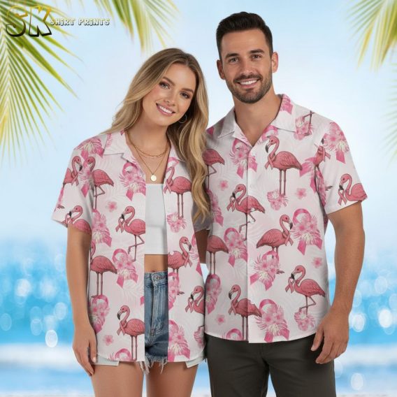 Pink and black Hawaiian shirt showing flamingo design with tropical flowers and ribbon details