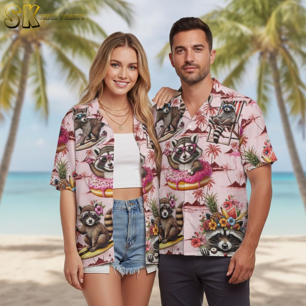 Pink and black Hawaiian shirt showing raccoons in sunglasses with tropical elements and contrasting colors
