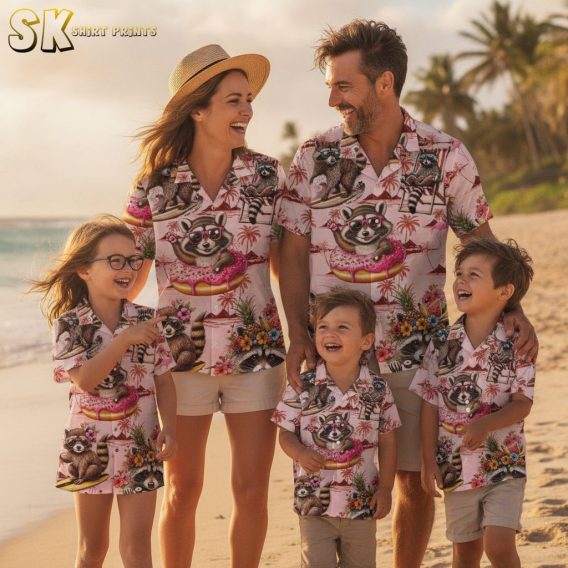 Pink and blue Hawaiian shirt with raccoons in tropical scenes, palm trees and summer activities