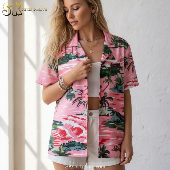 Pink and white Hawaiian shirt with tropical hibiscus flowers, palm trees, and wave patterns in soft color palette