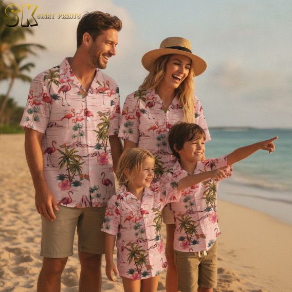 Pink floral hawaiian shirt with hibiscus flower patterns, flamingo birds, and tropical foliage design