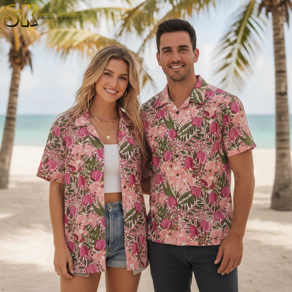 Pink floral hawaiian shirt with purple orchid-style flowers and green leaves