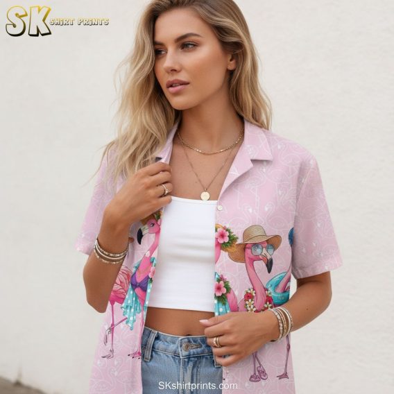 Pink men's Hawaiian shirt with flamingo graphics wearing scarves and summer gear