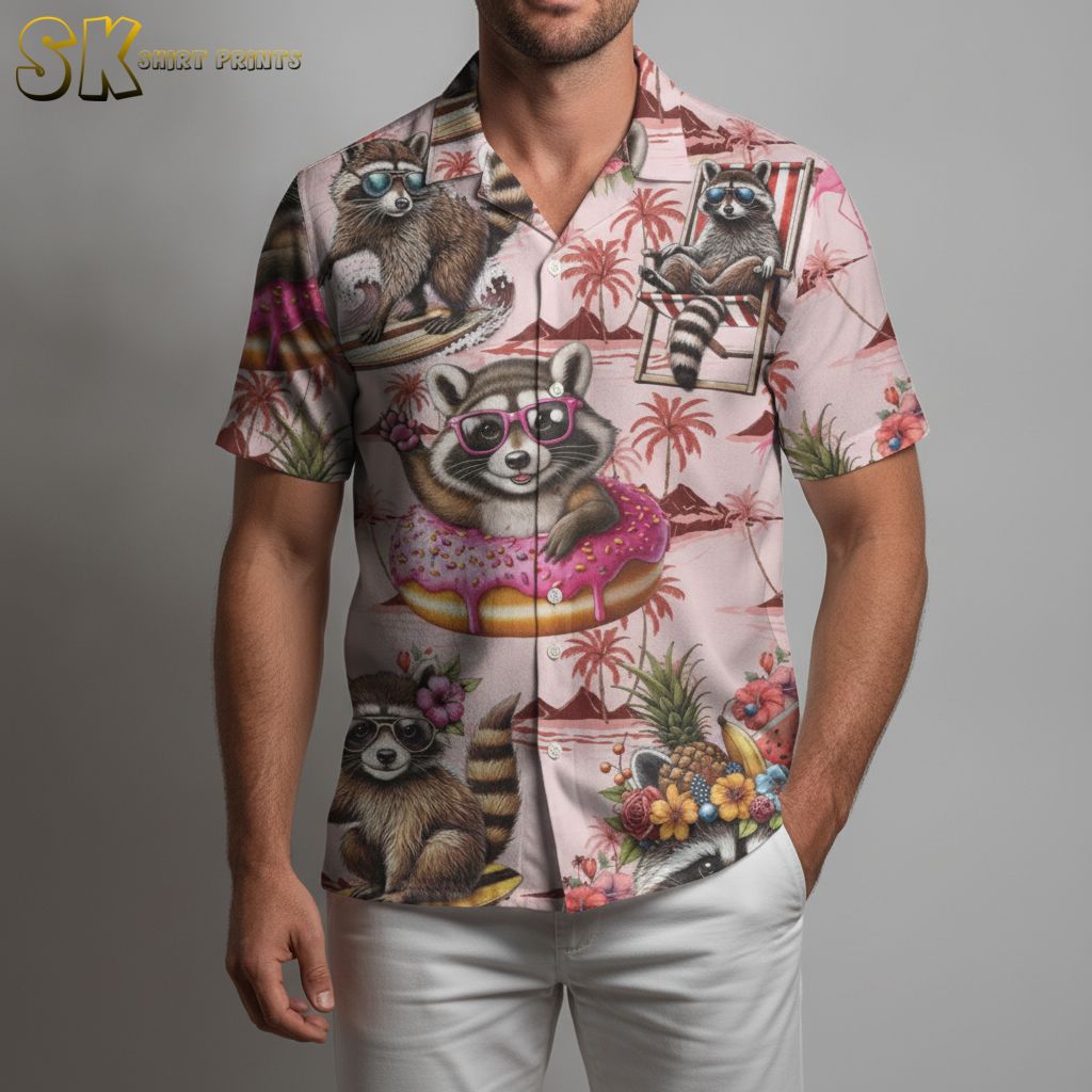 Pink pineapple Hawaiian shirt showing cartoon raccoons surfing with tropical pineapple and fruit patterns