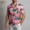 Pink pineapple Hawaiian shirt with tropical elements including palm trees and hibiscus flowers in pink and green pattern