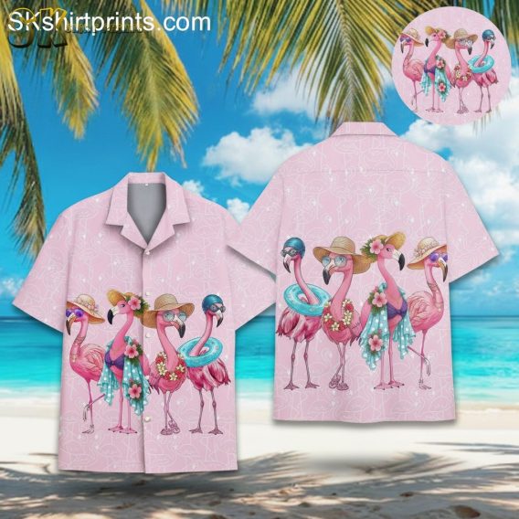 Pink tropical shirt featuring flamingos wearing summer accessories on light pink background