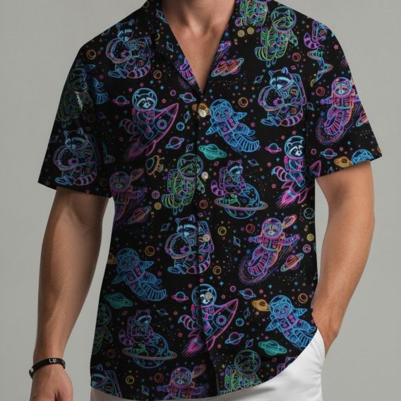 Men's button down Hawaiian shirt with raccoon astronauts riding rockets and floating in space, printed across the full fabric in neon colors