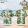 USA 250th Hawaiian shirt featuring large green leaves, red yellow and blue flowers, bold USA text with red and gold accents, and a 250 Years of Freedom banner on a light blue background