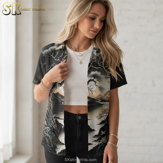 Vintage Hawaiian shirt with a dark tonal nature print showing trees, clouds, mountains, and water in black, gray, and brown colorway