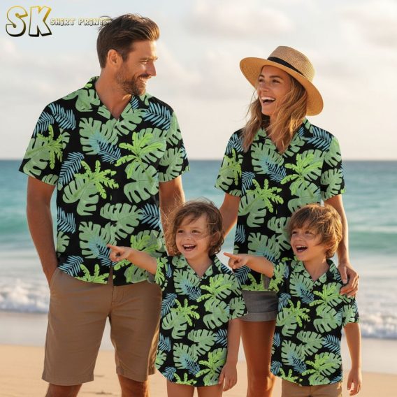 Women's green Hawaiian shirt with palm fronds and monstera leaves on black background