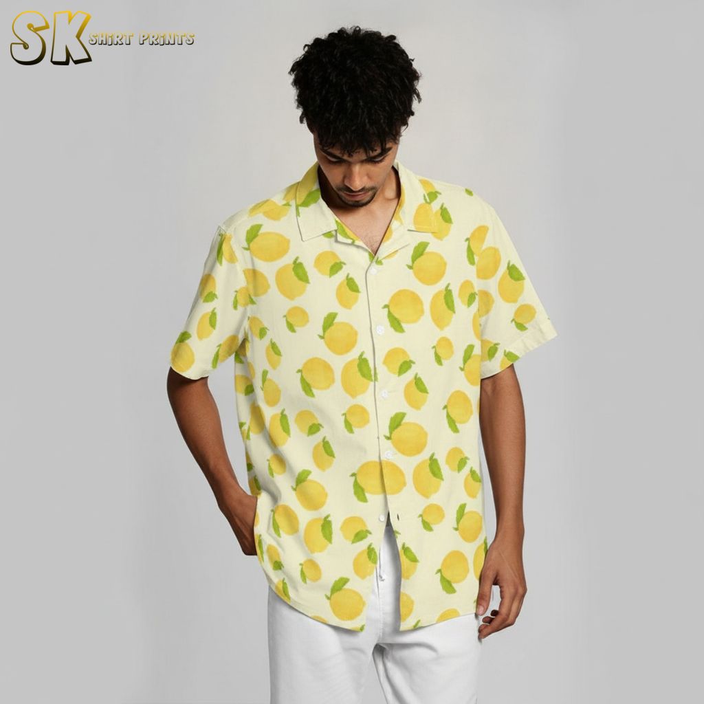 Yellow hawaiian shirt with decorative lemon and leaf citrus pattern