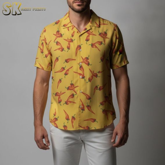 Yellow pineapple Hawaiian shirt displaying red chili peppers with green stems on yellow tropical fabric