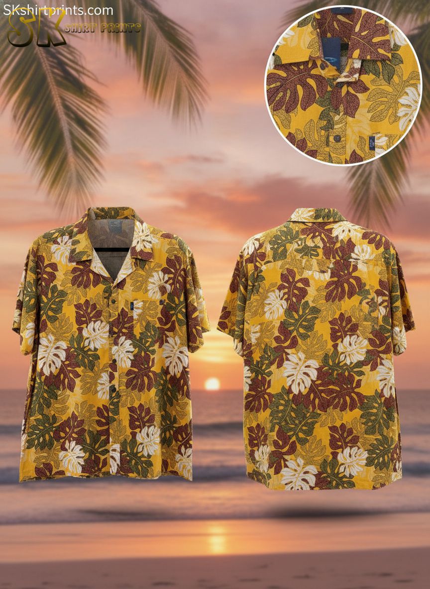Yellow tropical shirt featuring large white, maroon and green leaf patterns with detailed vein designs