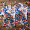 250 years of America Hawaiian shirt laid flat showing full print detail: skeleton in blue star suit and American flag top hat, fireworks, red white and blue stars and stripes, and America 250 1776–2026 text