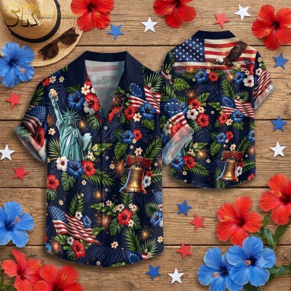 Flat lay display of a 250th anniversary Hawaiian shirt showing full print detail including Statue of Liberty, Liberty Bell, bald eagle, American flag, hibiscus flowers, and firework graphics