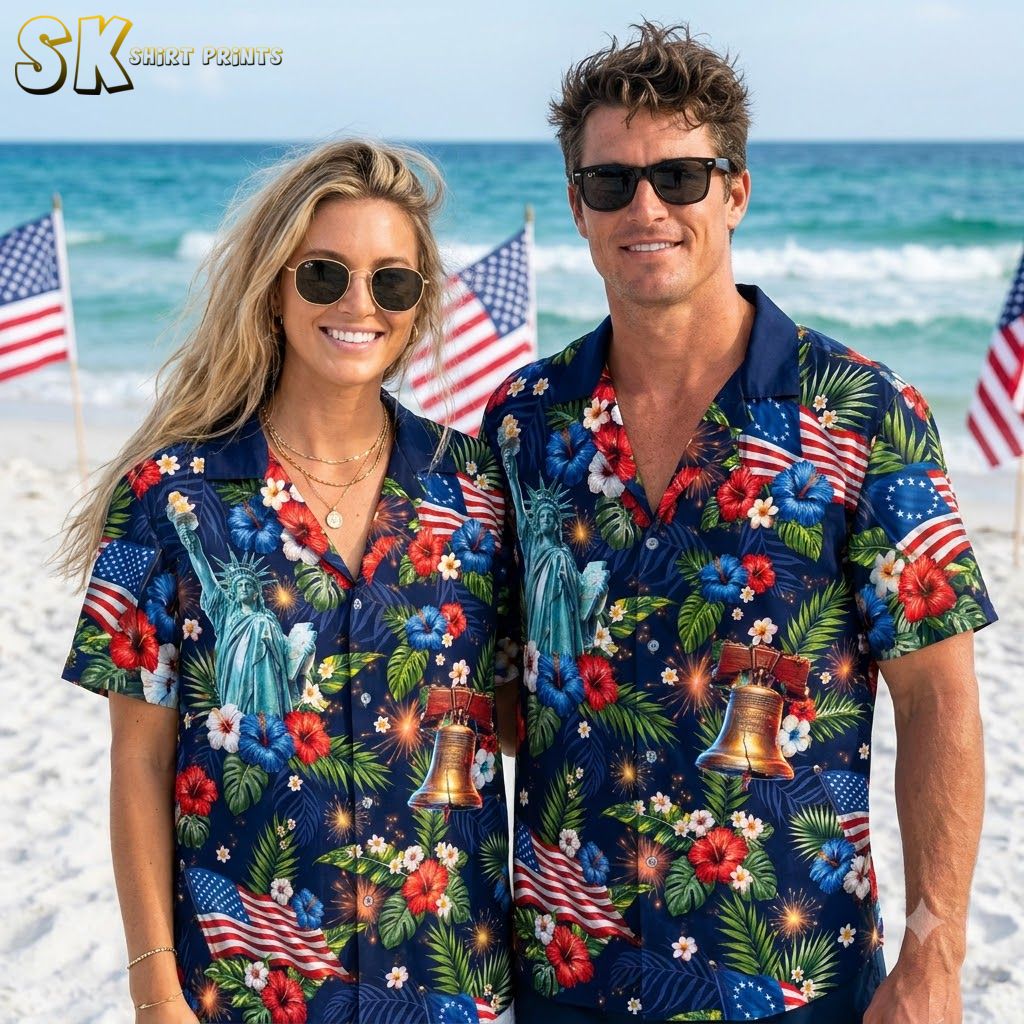 Couple wearing America 250th anniversary Hawaiian shirts in multiple color variants, showing patriotic print with Statue of Liberty, bald eagle, hibiscus flowers, and American flag
