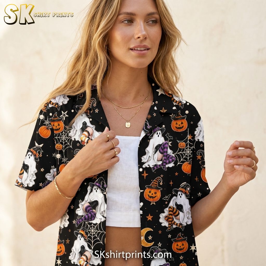 Close-up lifestyle photo of a woman wearing a Halloween costume Hawaiian shirt with ghost, jack-o-lantern, bat, and spiderweb print on a black background