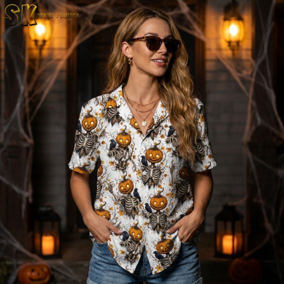 Female model wearing a Hawaiian shirt Halloween costume with skeleton jack-o'-lantern head print, black crows, and autumn leaves pattern