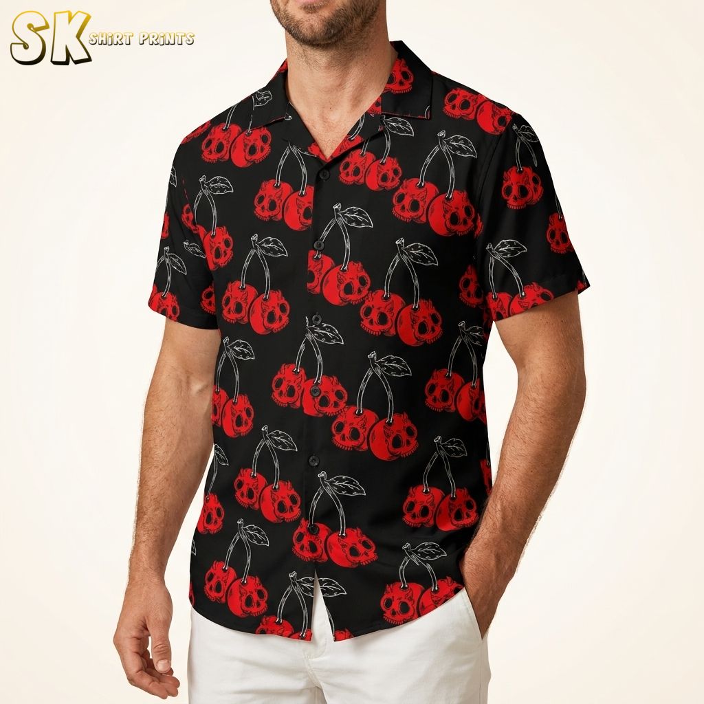 Men's black Hawaiian shirt with red cherry skull pattern, studio photo on male model, warm white background