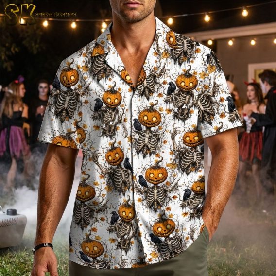 Male model wearing a men's Halloween Hawaiian shirt with skeleton jack-o'-lantern head figures, black crows, and autumn leaves on the pattern