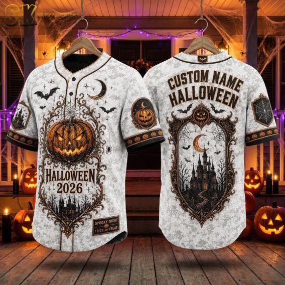 Reyn Spooner Halloween shirt displayed on ghost mannequin, featuring carved jack-o-lantern, flying bats, crescent moon, spider webs, and gothic haunted house print with Halloween 2026 text
