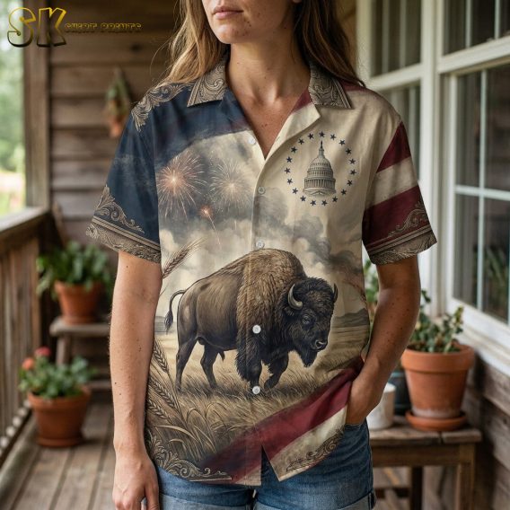 Woman wearing 250 years of America Hawaiian shirt, close-up showing Capitol building medallion, bison illustration, wheat field, and filigree collar trim detail