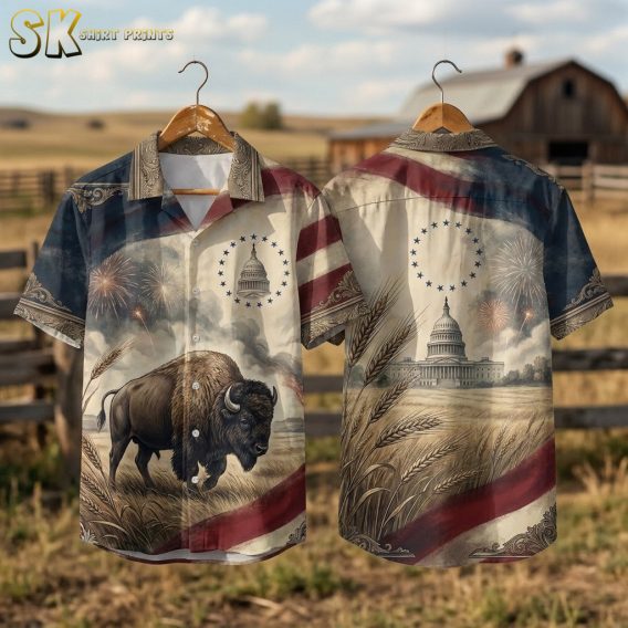 250th anniversary Hawaiian shirt shown front and back on hanger, featuring bison, U.S. Capitol building, wheat fields, and fireworks in beige, red, and blue tones