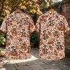 Front and back hanger view of a cream halloween hawaiian shirt printed with dancing colonial skeletons, jack-o'-lanterns, Liberty Bells, and America 250 crests.
