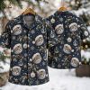 Men's Christmas Hawaiian shirt on hanger showing front and back, dark blue fabric with cats wearing Santa hats, snowflakes, gold stars, and ornament baubles