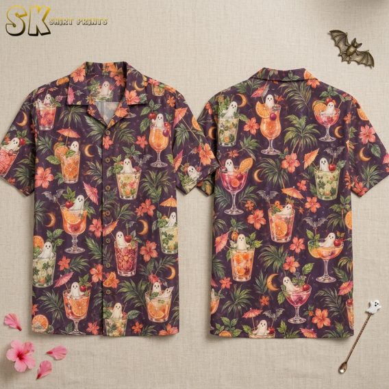 Flat lay of a dark purple halloween hawaiian shirt showing the front and back with an all-over print of ghost-filled cocktails, hibiscus blooms, crescent moons, and bats.