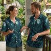 Couple wearing Halloween costumes with a Hawaiian shirt in the Mystical Moonlit Jungle print showing all available color variants