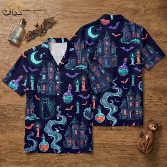 Flat lay of a Halloween Hawaiian shirt showing front and back on a dark navy blue short-sleeve button-up with haunted houses, bats, black cats, potion bottles, and neon Halloween accents