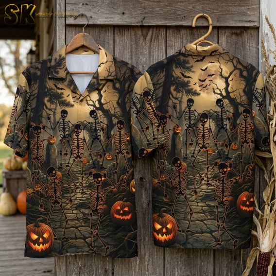 Halloween Hawaiian shirt shown front and back on hanger, featuring dancing skeletons, glowing jack-o'-lanterns, bats, and twisted trees on a dark background
