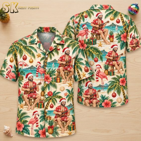 Flat lay of a Hawaiian Christmas shirt showing front and back with Santa ukulele, palm trees, flamingos, hibiscus, candy canes, and ornaments in red and green repeating pattern