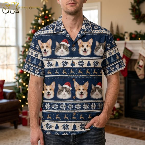 Man wearing a men's Hawaiian Christmas shirt with a navy blue pattern of dogs and cats in Santa hats, snowflakes, and Christmas trees