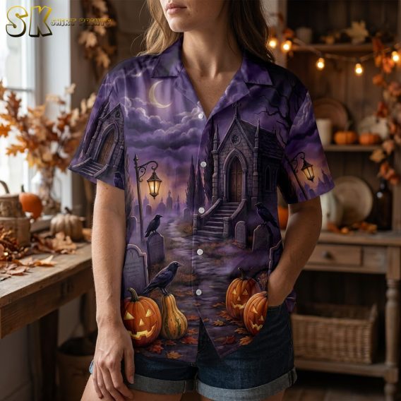 Closeup of a woman wearing a hawaiian shirt halloween costume with detailed jack-o-lanterns, gravestones, crows, and autumn leaves on a purple background