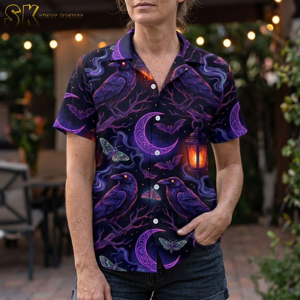 Female closeup of a Hawaiian shirt Halloween costume showing detailed crow, moth, crescent moon, and lantern print in purple, black, and orange