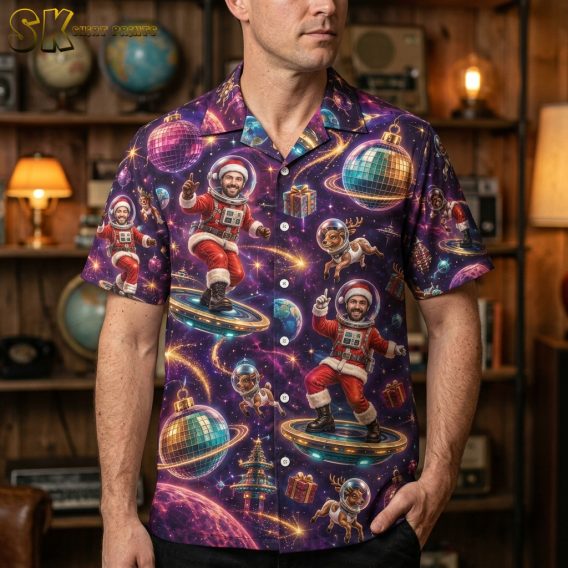 Man wearing a mens christmas hawaiian shirt with space Santa, reindeer, planets, and disco ball print in purple and blue