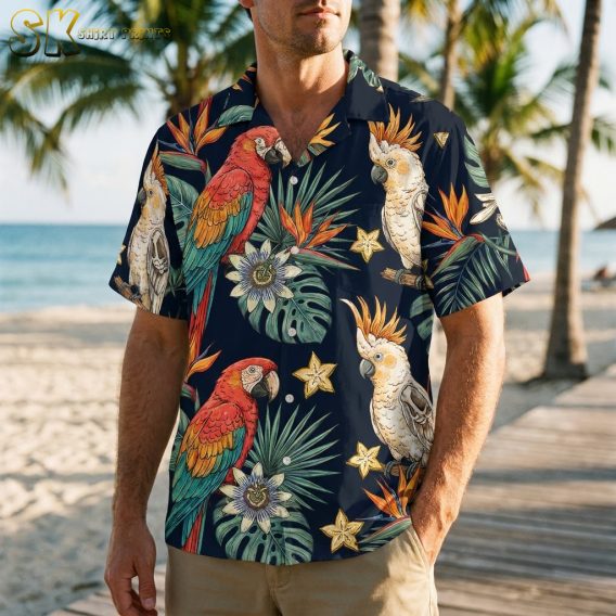 Man wearing mens halloween hawaiian shirt with navy blue parrot and tropical leaf print in outdoor lifestyle setting
