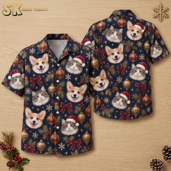 Men's Hawaiian Christmas shirt flat lay showing front and back of dark blue short-sleeve button-up with corgi and cat Santa hat print, gold ornaments, red bows, and holly berries