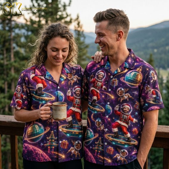 Couple wearing matching xmas Hawaiian shirts with space Santa, reindeer, planets, and disco balls in purple and blue tones