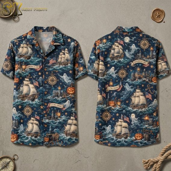 Front and back hanger view of a navy blue short-sleeve button-up shirt printed with sailing ships, ghost figures, carved pumpkins, compasses, and