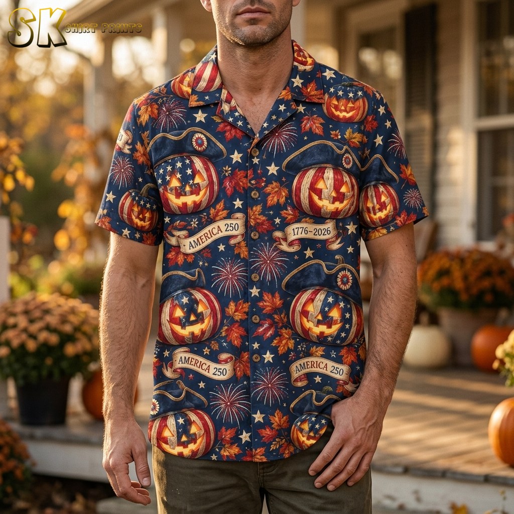 A man wearing the navy blue America 250 Halloween Hawaiian shirt, showing the all-over pattern of patriotic jack-o'-lanterns, tricorn hats, and fireworks in a lifestyle setting.
