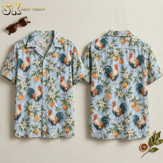 Front and back of a light blue rooster Hawaiian shirt displayed side by side with orange fruit and white floral motifs.