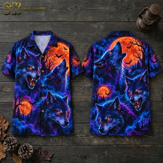 Front and back of a Halloween Hawaiian shirt lie on dark wooden boards, showing blue wolves and bright orange moons.