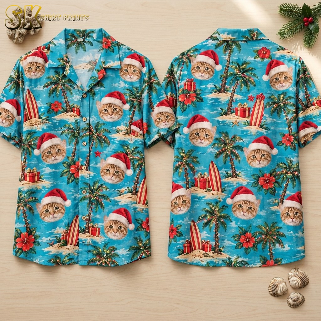 Front and back of a turquoise xmas Hawaiian shirt laid flat, showing photorealistic orange cat faces in Santa hats scattered across a tropical island scene with palm trees, hibiscus flowers, and striped surfboards.